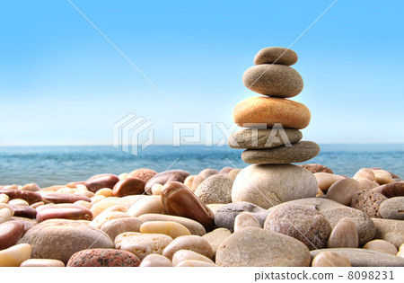 Stack of pebble stones on white Stack of pebble stones on white 8098231