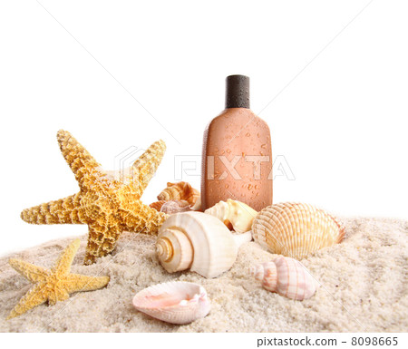 Suntan lotion and seashells on white 8098665