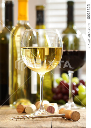 Glasses of wine with bottles 8098823