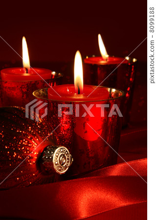 Red candles with ribbons Red candles with ribbons 8099188