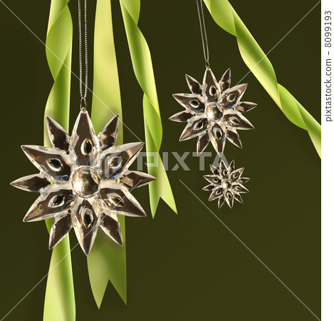 Crystal snowflakes with green ribbons Crystal snowflakes with green ribbons 8099193