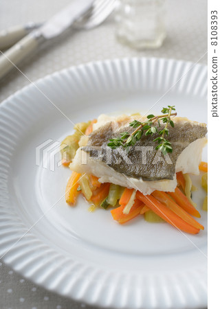 Baked cod with vegetables 8108393