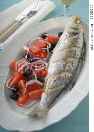 Baked sea bass with vegetables Baked sea bass with vegetables 8108395