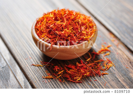 Saffron in wooden bowl Saffron in wooden bowl 8109710