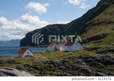 Houses near the lighthouse of Runde Island (Norway) 8114176