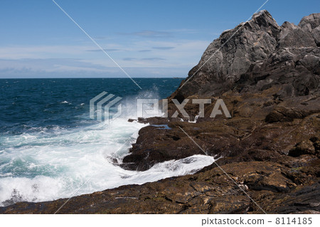 Splashing waves at Runde Island near the lighthouse (Norway) 8114185