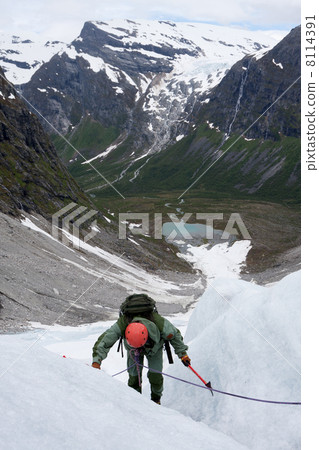 Man climbing Bodalsbreen glacier (Jostedalsbreen national park, 8114391