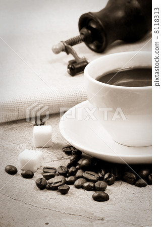 coffee beans and grinder on sack 8118313