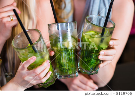 women or colleagues in cafe, bar or restaurant 8119706