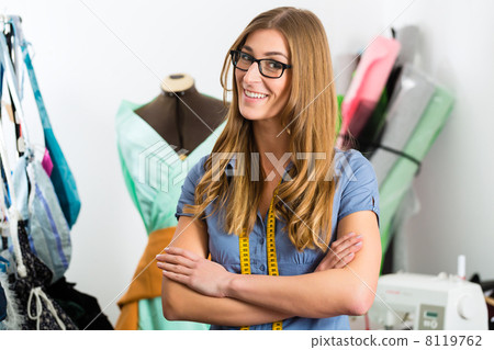 Fashion designer or tailor working in studio Fashion designer or tailor working in studio 8119762