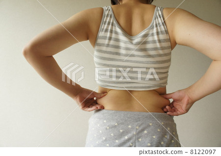 A woman holding a back 8122097