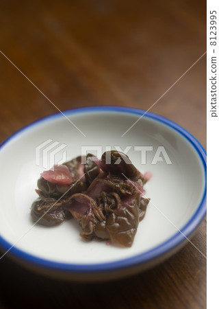 Pickled in purple leaves 8123995