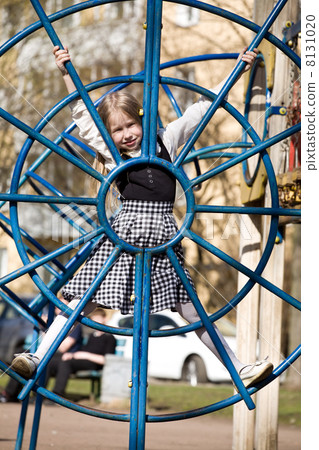 closeup of little girl on outdoor playground closeup of little girl on outdoor playground 8131020