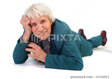 Elderly woman is laying at the floor Elderly woman is laying at the floor 8134921