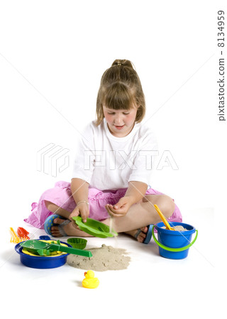 playing with sand playing with sand 8134959