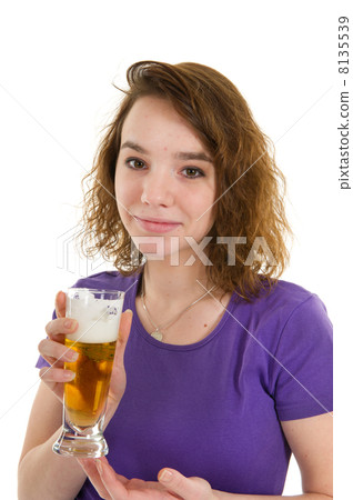 Young girl is drinking beer 8135539