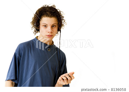 Boy listening to music Boy listening to music 8136058