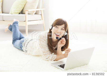 A woman relaxing in the room A woman relaxing in the room 8136502