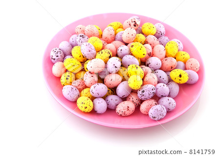 Pink plate filled with easter eggs Pink plate filled with easter eggs 8141759