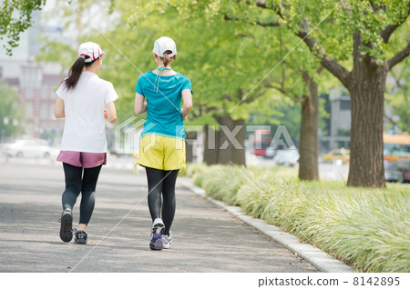 Two women jogging 8142895