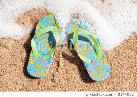 Flip flops at the beach Flip flops at the beach 8144052