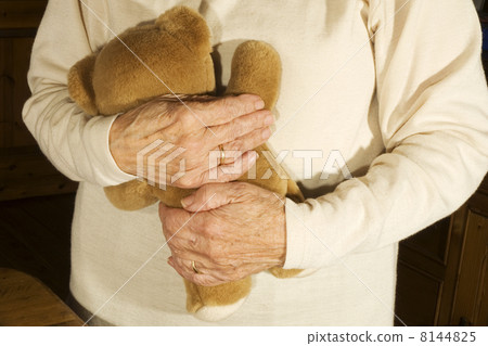 Old demented person is playing Old demented person is playing 8144825