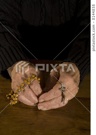 Hands with rosary Hands with rosary 8144838