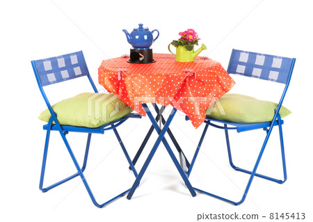 Blue furniture with tea and flowers Blue furniture with tea and flowers 8145413