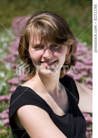 Young woman in a garden 8151198