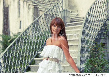Beautiful woman near old palace 8151998