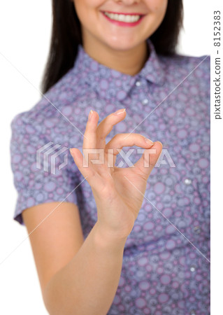 smiling girl showing OK sign 8152383