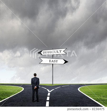 Businessman at crossroads 8156475