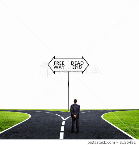 Businessman at crossroads Businessman at crossroads 8156481