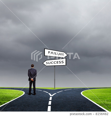 Businessman at crossroads 8156482