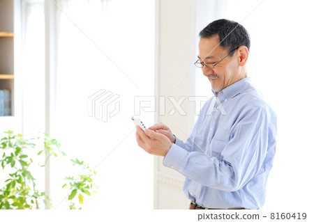 Senior men using smartphones 8160419