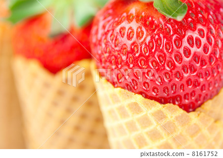 strawberry in a waffle cone closeup 8161752