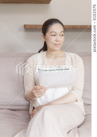 A woman with a divorce notification A woman with a divorce notification 8162076