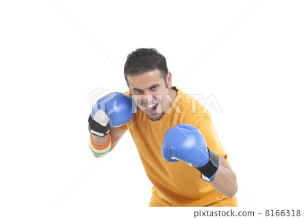 Portrait of young male boxer in a fighting stance over white background Portrait of young male boxer in a fighting stance over white background 8166318