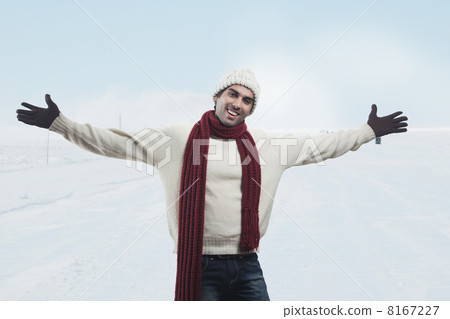 Portrait of smiling man with arms outstretched 8167227