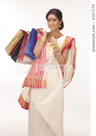 Bengali woman with shopping bags 8167379