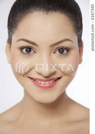 Smiling young woman over white background 8167380