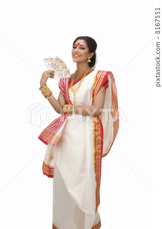 Portrait of Bengali woman holding currency notes 8167551