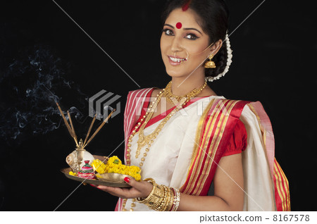 Portrait of Bengali woman with puja thali Portrait of Bengali woman with puja thali 8167578