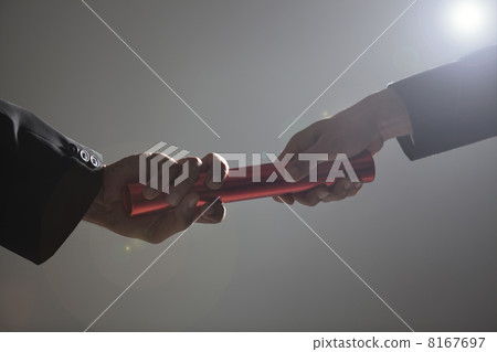 Close-up of hands holding a baton 8167697