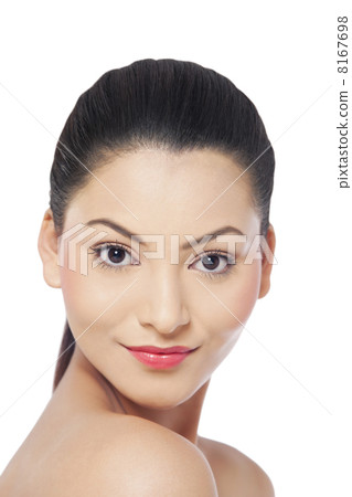 Portrait of a smiling young woman over white background 8167698