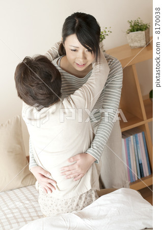 A girl taking care of her mother 8170038