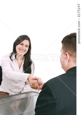 Two businesspeople, or business person and client handshaking at 8175247
