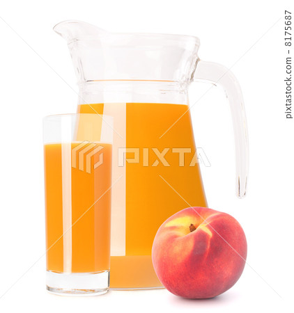 Peach fruit juice in glass jug 8175687