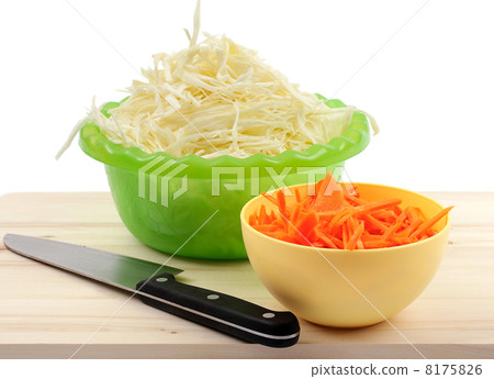 sliced cabbage and carrots 8175826