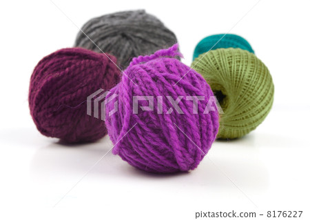 Several balls of wool on a white background Several balls of wool on a white background 8176227